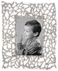 Natural wonder. Organically molded, cast and finished by hand, the Abstract Coral picture frame exemplifies Donna Karan's love of elemental textures. Nickel-plated brass echoes the intricate tendrils of undersea creatures yet perfectly suits modern homes. Natural wonder. Organically molded, cast and finished by hand, the Abstract Coral picture frame exemplifies Donna Karan's love of elemental textures. Nickel-plated brass echoes the intricate tendrils of undersea creatures yet perfectly suits modern homes.