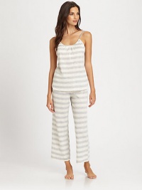 Experience the ultimate in comfortable sleepwear with this striped set, rendered in soft jersey fabric with a hint of texture. Smocked scoopneckAdjustable spaghetti strapsShelf bra for supportMesh liningDrawstring waistbandInseam, about 2569% polyester/18% rayon/13% cottonMachine washImported