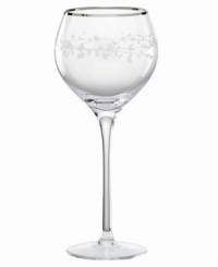 A vision of contemporary elegance from kate spade, this crystal wine glass is shaped by soft, fluid lines and etched stems of leafy foliage. Finished with a polished platinum rim.