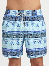 Woven swim trunk with drawstring, elastic waist and back eyelets to avoid ballooning, set in quick-drying nylon.Drawstring elastic waistSide slash, back flap pocketsPolyamideMachine washImported Woven swim trunk with drawstring, elastic waist and back eyelets to avoid ballooning, set in quick-drying nylon.Drawstring elastic waistSide slash, back flap pocketsPolyamideMachine washImported