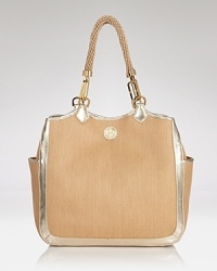 The St. Barths bound will love the latest, beachy addition to Tory Burch's polished portfolio. In woven straw with metallic leather trim this tote perfects on-vacation style. The St. Barths bound will love the latest, beachy addition to Tory Burch's polished portfolio. In woven straw with metallic leather trim this tote perfects on-vacation style.
