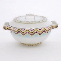 From the fashion house of Missoni, Margherita bone china is decorated with multicolor kaleidoscopic flowers.