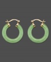 Go for a smooth and calming look with these beautiful jade hoop earrings set in 14k gold. Approximate diameter: 1 inch.
