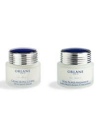 This exclusive Orlane Paris set includes the full sizes of the Super Hydratant Super Moisturizing Concentrate and the Ultra Light Cream - two magnificent treatments in one set. Super Moisturizing Concentrate is an intensive moisturizing and energizing formula that works all day to restore skin's optimal moisture balance. Use in the morning before makeup application and/or at night to help your skin regain its supple, satin-smooth feel. This exclusive Orlane Paris set includes the full sizes of the Super Hydratant Super Moisturizing Concentrate and the Ultra Light Cream - two magnificent treatments in one set. Super Moisturizing Concentrate is an intensive moisturizing and energizing formula that works all day to restore skin's optimal moisture balance. Use in the morning before makeup application and/or at night to help your skin regain its supple, satin-smooth feel.