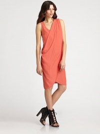 Minimalist-chic in a draped crossover-front sheath.ScoopneckSleevelessDraped front overlayTulip hemAbout 39 from shoulder to hemPolyesterDry cleanImportedModel shown is 5'10 (177cm) wearing US size 4.