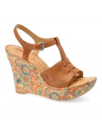 Down to earth and up on fashion. The Rebecka sandals by Born are hippie chic with their floral-printed raffia wedge heel and luxe leather T-strap. Down to earth and up on fashion. The Rebecka sandals by Born are hippie chic with their floral-printed raffia wedge heel and luxe leather T-strap.