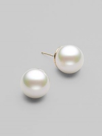 Simple and lovely, classic studs of lustrous white pearls to wear anywhere. 12mm organic man-made pearls 14k gold 14k gold post back Made in Spain