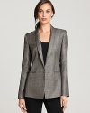 Embrace a bold silhouette as menswear tailoring lends commanding presence to this Elie Tahari jacket, finished with metallic threading for an on-trend touch of shine.