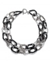 Neutral territory. With its practical black and gray palette, c.A.K.e. by Ali Khan's double necklace will mix and match effortlessly within your wardrobe. Adorned with faceted glass rondelle accents, it's made in silver tone mixed metal and includes a toggle closure. Approximate length: 18 inches.