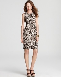 Polished enough for the office yet daring enough for after-dark, embrace your fashion fierceness in this Anne Klein Dress animal-print sheath. Polished enough for the office yet daring enough for after-dark, embrace your fashion fierceness in this Anne Klein Dress animal-print sheath.