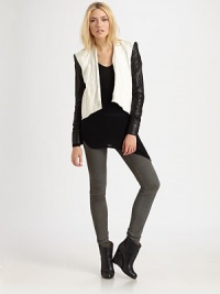 Ruched leather sleeves pair with crushed linen in this cropped and contoured blazer.V necklineSingle-button closureContour hemAbout 24 from shoulder to hem41% linen/27% cotton/21% polyester/11% metallic fibersDry clean by a leather specialistImportedModel shown is 5'9½ (177cm) wearing US size 4.OUR FIT MODEL RECOMMENDS ordering true size. Ruched leather sleeves pair with crushed linen in this cropped and contoured blazer.V necklineSingle-button closureContour hemAbout 24 from shoulder to hem41% linen/27% cotton/21% polyester/11% metallic fibersDry clean by a leather specialistImportedModel shown is 5'9½ (177cm) wearing US size 4.OUR FIT MODEL RECOMMENDS ordering true size.
