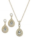 Impeccable fashion from Swarovski. This pendant necklace and earring set features pear-shaped clear crystals framed in clear crystal pave. Crafted in 22k gold-plated mixed metal. Approximate length (necklace): 16 inches + 1-1/2-inch extender. Approximate drop (both): 1-1/2 inches.