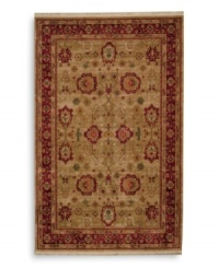 Inspired by an early 20th-century carpet woven in western Turkey, this oushak rug features an enlarged palmette trellis design surrounded by a rosette border in a rich palette of red, gold and green. Subtle gradations of color evoke the timeworn striated effect created by aged vegetable dyes. A patented wash process further harmonizes the colors into a rich vintage finish. Woven in the USA in premium worsted New Zealand wool for luxurious softness. Inspired by an early 20th-century carpet woven in western Turkey, this oushak rug features an enlarged palmette trellis design surrounded by a rosette border in a rich palette of red, gold and green. Subtle gradations of color evoke the timeworn striated effect created by aged vegetable dyes. A patented wash process further harmonizes the colors into a rich vintage finish. Woven in the USA in premium worsted New Zealand wool for luxurious softness.