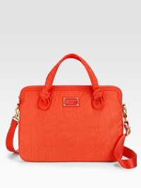 Signature quilted nylon is at the center of this design, complete with a logo plaque and elegantly-knotted top handles. Zip-around closureDouble top handles, 4 dropAdjustable, detachable shoulder strap, 9-20½ dropFully lined15W X 11¼H X 1½DImportedPlease note: Laptop not included. Signature quilted nylon is at the center of this design, complete with a logo plaque and elegantly-knotted top handles. Zip-around closureDouble top handles, 4 dropAdjustable, detachable shoulder strap, 9-20½ dropFully lined15W X 11¼H X 1½DImportedPlease note: Laptop not included.