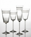 The Library Stripe goblet is a perfect example of what kate spade does best: mixing classical design with modern touches. Alternating deep cut bands of frosted and clear crystal combine for a chic sensibility. Goblet shown far right.