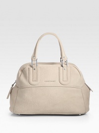 A timeless, functional design in buffed nubuck leather with logo detail.Double leather handles, 6½; dropTop zipperOne inside zip pocketThree inside open pocketsFully linedProtective metal feet17¼W X 10½H X 8DImported A timeless, functional design in buffed nubuck leather with logo detail.Double leather handles, 6½; dropTop zipperOne inside zip pocketThree inside open pocketsFully linedProtective metal feet17¼W X 10½H X 8DImported