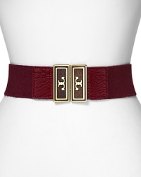 With gold-tone hardware, Tory Burch's elastic belt is a logo-stamped pick-up. For easy elegance, wear it over a classic day dress with gleaming extras. With gold-tone hardware, Tory Burch's elastic belt is a logo-stamped pick-up. For easy elegance, wear it over a classic day dress with gleaming extras.