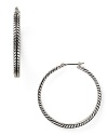 Glamor defined: subtle texture gives these silver-plated hoop earrings from Lauren Ralph Lauren added dimension. Wear them to take your look from simple to striking.
