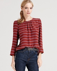 This silk Tegan top is striped to the nines and a match made in heaven with any of your denim favorites. This silk Tegan top is striped to the nines and a match made in heaven with any of your denim favorites.