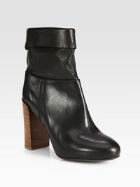 Crafted with a fold-over cuff and hidden platform, this is a modern take on the slouchy classic.Stacked heel, 3¾ (95mm)Hidden platform, ¾ (20mm)Compares to a 3 heel (75mm)Leather upperLeather lining and solePadded insoleMade in ItalyThis style runs true to size. We recommend ordering your usual size for a standard fit. Crafted with a fold-over cuff and hidden platform, this is a modern take on the slouchy classic.Stacked heel, 3¾ (95mm)Hidden platform, ¾ (20mm)Compares to a 3 heel (75mm)Leather upperLeather lining and solePadded insoleMade in ItalyThis style runs true to size. We recommend ordering your usual size for a standard fit.