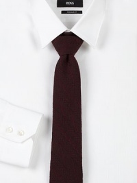 Dress wardrobe standard woven in a textured wool and silk blend.Wool and silkDry cleanMade in USA