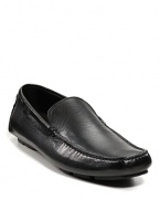 A sleek, sporty loafer in leather, with excellent traction and the logo at the sole.