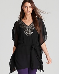 An embellished neckline glams up a flowing MICHAEL Michael Kors top, finished with sheer sleeves for a chic approach to bohemia. An embellished neckline glams up a flowing MICHAEL Michael Kors top, finished with sheer sleeves for a chic approach to bohemia.