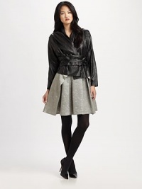 Dramatic dolman sleeves and pleats add an elegant touch to this cropped jacket made from butter-soft lambskin leather.Feminine necklineDolman sleevesOptional self-tie beltAbout 23 from shoulder to hemLambskin leatherDry clean by leather specialistImported Model shown is 5'9 (175cm) wearing US size Small. Dramatic dolman sleeves and pleats add an elegant touch to this cropped jacket made from butter-soft lambskin leather.Feminine necklineDolman sleevesOptional self-tie beltAbout 23 from shoulder to hemLambskin leatherDry clean by leather specialistImported Model shown is 5'9 (175cm) wearing US size Small.