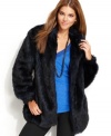 Snuggle into this faux-fur coat by DKNY Jeans. In an unexpected deep blue, it's right-on trend for fall.