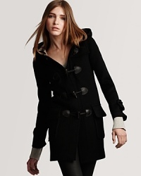 Toggle closures and a hood lend preppy chic to Burberry Brit's timeless wool coat. Toggle closures and a hood lend preppy chic to Burberry Brit's timeless wool coat.
