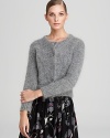 Touchably textured, this mohair-blend DKNY cardigan lends a lush layer to you everyday looks.