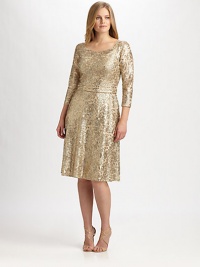 Shimmer and shine, a stunning style featuring a gorgeous metallic lace and allover sequins. Round neckThree-quarter sleevesAllover beadingConcealed back zipperFully linedAbout 23 from natural waist70% polyester/30% metallic threadDry cleanMade in USA of imported fabric Shimmer and shine, a stunning style featuring a gorgeous metallic lace and allover sequins. Round neckThree-quarter sleevesAllover beadingConcealed back zipperFully linedAbout 23 from natural waist70% polyester/30% metallic threadDry cleanMade in USA of imported fabric