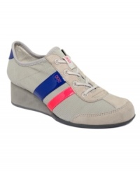 Look lovely and trendy in DKNY Women's Raina wedge sneakers. With a few brightly-colored straps and a wedge heel, this is the style for you. Look lovely and trendy in DKNY Women's Raina wedge sneakers. With a few brightly-colored straps and a wedge heel, this is the style for you.