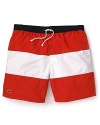 Catch some rays in these bright colorblock shorts, featuring a drawstring waist and an embossed croc on the lower leg.