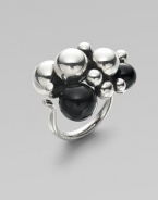 Make a simple statement with this sterling silver piece accented with black agate featuring an organic cluster of spheres. Black agateSterling silverAdjustable fit Width, about 1Imported