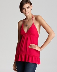 This Patterson J. Kincaid halter top, complete with ruffled hem, is an effortless way to add color and femininity to your warm-weather wardrobe. This Patterson J. Kincaid halter top, complete with ruffled hem, is an effortless way to add color and femininity to your warm-weather wardrobe.