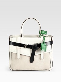 An elegant and sturdy style in brushed, glove tanned leather and textured hair calf in a colorblocked design.Double top handles, 6 dropOpen topOne outside open pocketOne outside flap pocketTwo inside zip pocketsTwo inside open pocketsDetachable luggage tagCotton lining12¾W X 10H X 4DImported An elegant and sturdy style in brushed, glove tanned leather and textured hair calf in a colorblocked design.Double top handles, 6 dropOpen topOne outside open pocketOne outside flap pocketTwo inside zip pocketsTwo inside open pocketsDetachable luggage tagCotton lining12¾W X 10H X 4DImported