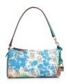 An fun-loving take on a Dooney & Bourke classic. A unique logo detailed print is splashed on a mini barrel silhouette for a style that will add eye-catching interest to any ensemble.