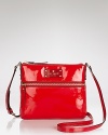 kate spade new york crafts a shining example of stylish functionality with this sleek, patent leather crossbody.