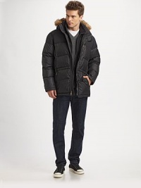 Exceptionally stylish and warm, this winter favorite is enriched with a removable hood trimmed with coyote fur.Zip frontHalf snap button placketRemovable hoodZippered chest, waist pocketsAbout 31½ from shoulder to hemDown fillNylonDry cleanImportedFur origin: China Exceptionally stylish and warm, this winter favorite is enriched with a removable hood trimmed with coyote fur.Zip frontHalf snap button placketRemovable hoodZippered chest, waist pocketsAbout 31½ from shoulder to hemDown fillNylonDry cleanImportedFur origin: China