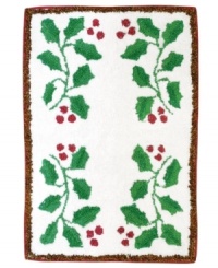 This rug lends festive charm to the bath. A cheerful holly with rich berries exude holiday spirit while the absorbent, pure cotton fabric is soft underfoot. This rug lends festive charm to the bath. A cheerful holly with rich berries exude holiday spirit while the absorbent, pure cotton fabric is soft underfoot.