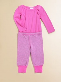 Keep baby snug in a soft knit with bottom snaps for easy on and off.Envelope neckline for comfort and easeLong sleevesSnap bottom50% cotton/50% modalMachine washImported Please note: Number of snaps may vary depending on size ordered. Keep baby snug in a soft knit with bottom snaps for easy on and off.Envelope neckline for comfort and easeLong sleevesSnap bottom50% cotton/50% modalMachine washImported Please note: Number of snaps may vary depending on size ordered.