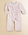 A cozy cotton one-piece is embellished with a flurry of ruffles and colorful polka dots.V-neckLong sleevesFront in-seam snapsCottonMachine washImported Please note: Number of snaps may vary depending on size ordered. 