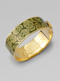 Rock edge meets pop art on this contemporary masterpiece as bright skull patterned enamel highlights a circular cuff.Enamel Brass Logo engraving Diameter, 2½ Width, ¾ Made in Italy Rock edge meets pop art on this contemporary masterpiece as bright skull patterned enamel highlights a circular cuff.Enamel Brass Logo engraving Diameter, 2½ Width, ¾ Made in Italy