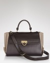 Rich, tonal leathers on this Salvatore Ferragamo satchel instantly update this forever-luxurious carryall.