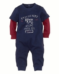 A preppy coverall in soft cotton jersey features sporty verbiage. A preppy coverall in soft cotton jersey features sporty verbiage.