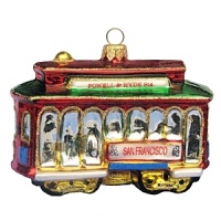 A glass holiday ornament rendition of the classic San Francisco cable car. A glass holiday ornament rendition of the classic San Francisco cable car.