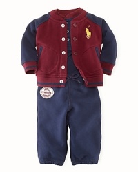 A soft, cozy three-piece set includes an athletic fleece jacket, a cotton jersey Henley bodysuit and comfortable, varsity-inspired sweatpants. A soft, cozy three-piece set includes an athletic fleece jacket, a cotton jersey Henley bodysuit and comfortable, varsity-inspired sweatpants.