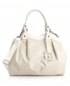 In logo jacquard fabric with an optional crossbody strap, the monogram Hudson purse by Calvin Klein dresses up or down.