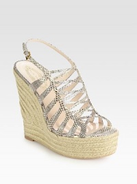 Snake-print leather in a trendy cage design with a hemp wedge and an adjustable slingback strap. Hemp wedge, 5½ (140mm)Hemp platform, 1 (25mm)Compares to a 4½ heel (115mm)Snake-print leather upperLeather lining and solePadded insoleImportedOUR FIT MODEL RECOMMENDS ordering one half size up as this style runs small. Snake-print leather in a trendy cage design with a hemp wedge and an adjustable slingback strap. Hemp wedge, 5½ (140mm)Hemp platform, 1 (25mm)Compares to a 4½ heel (115mm)Snake-print leather upperLeather lining and solePadded insoleImportedOUR FIT MODEL RECOMMENDS ordering one half size up as this style runs small.
